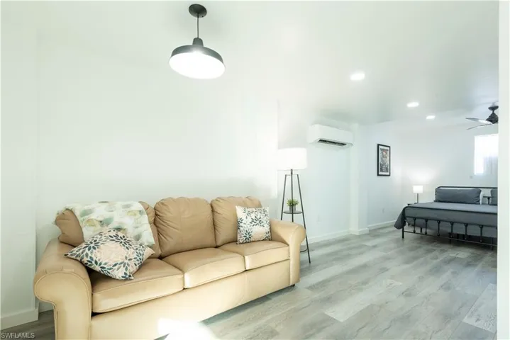 Lower-level room wall unit AC