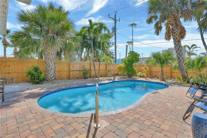 View of swimming pool with a patio area