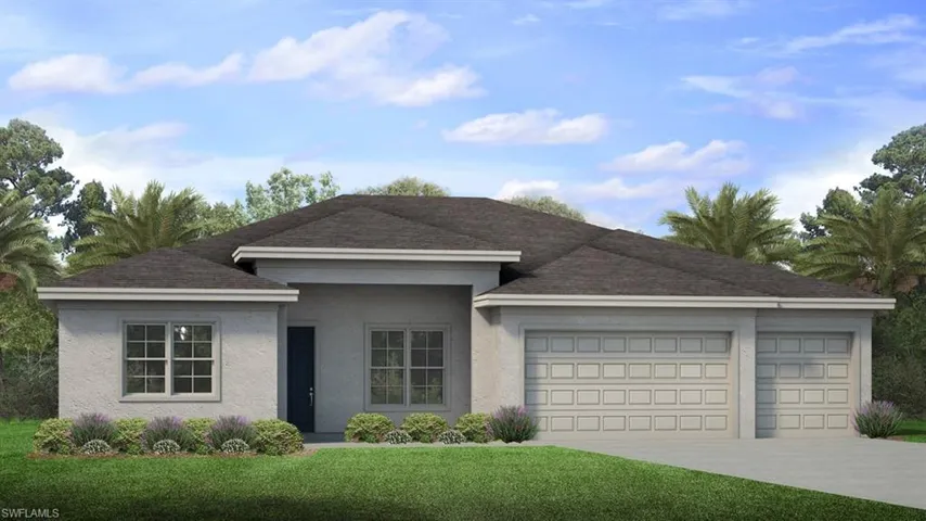 View of front facade featuring a garage and a front yard