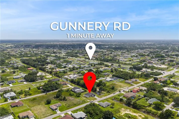 Aerial overview of property's location with nearby suburban area