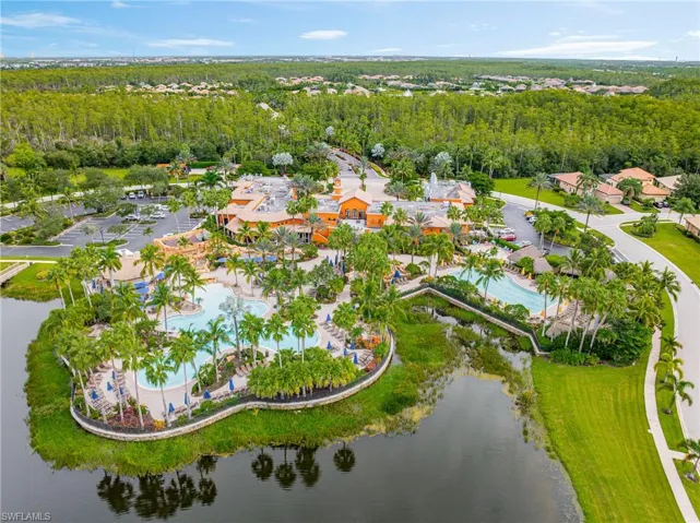 Aerial overview of property's location featuring a pool area
