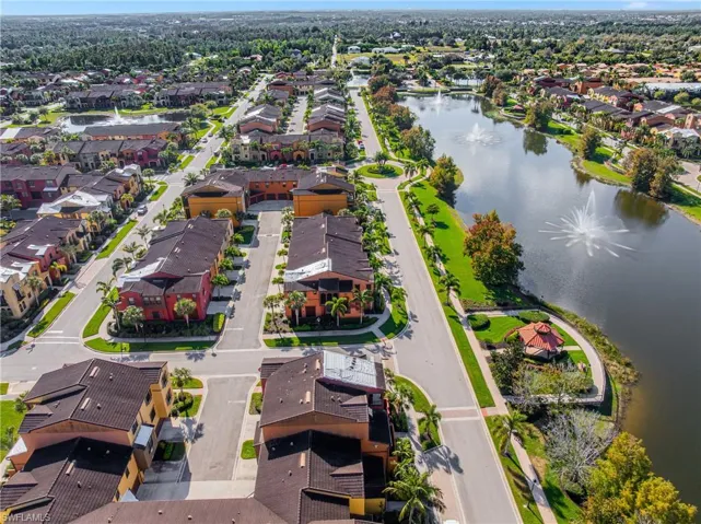 View of property location with a nearby body of water and nearby suburban area