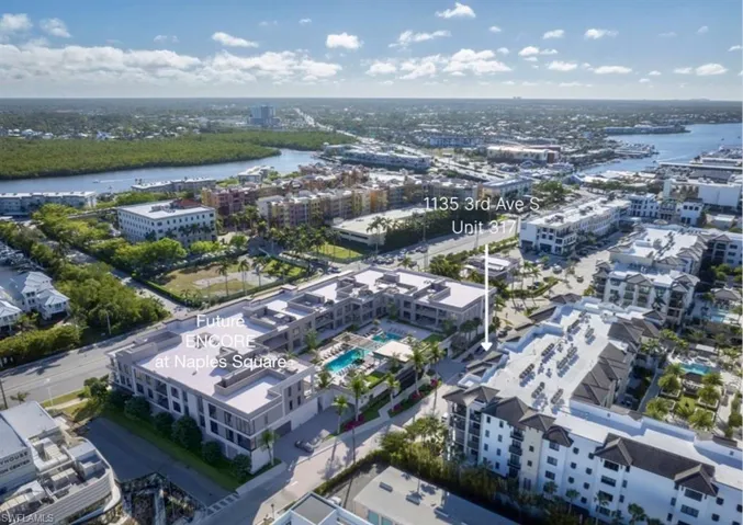 View of urban area featuring a nearby body of water
