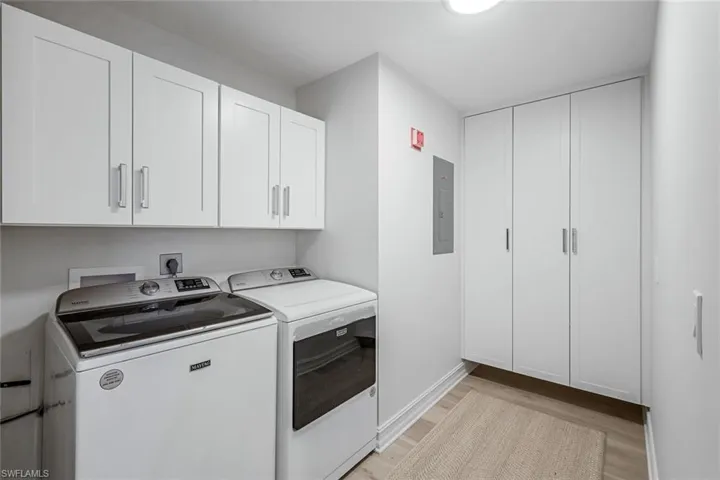 SPACIOUS LAUNDRY ROOM WITH EXTRA STORAGE
