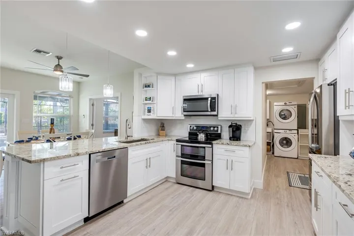 Open Kitchen with separate laundry area and garage access