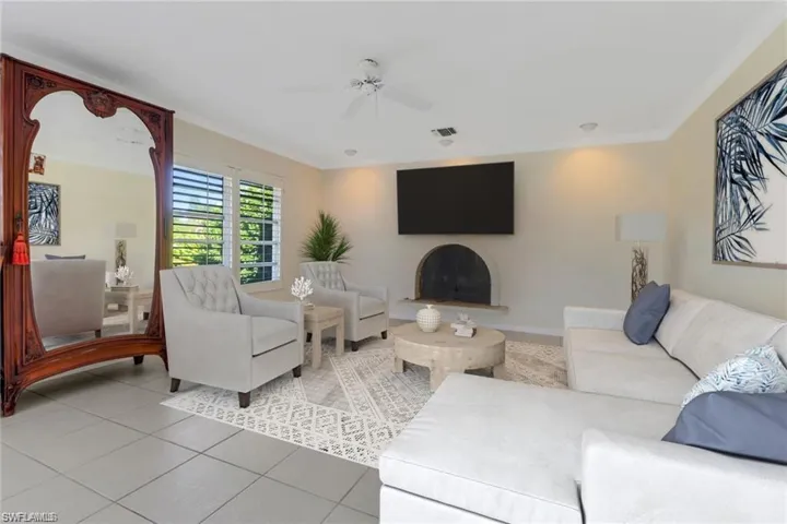 Tiled living area virtually staged