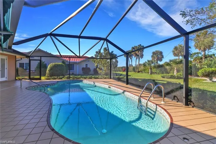 Pool with a patio area