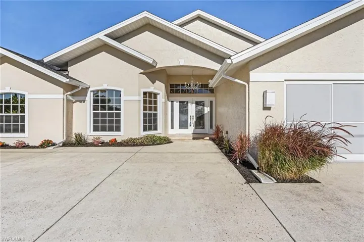 Entrance to property featuring french doors