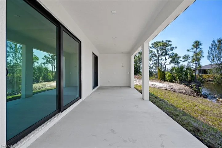 View of patio featuring a water view