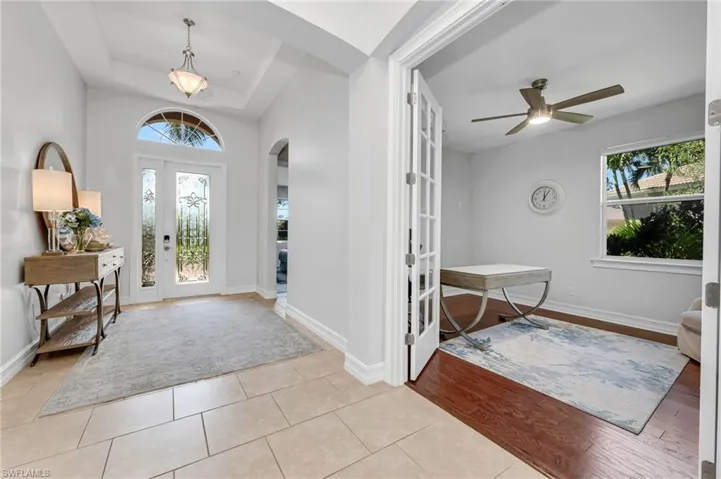 Grand entryway leading to the living and dining areas. This home is perfect for entertaining friends and family!...