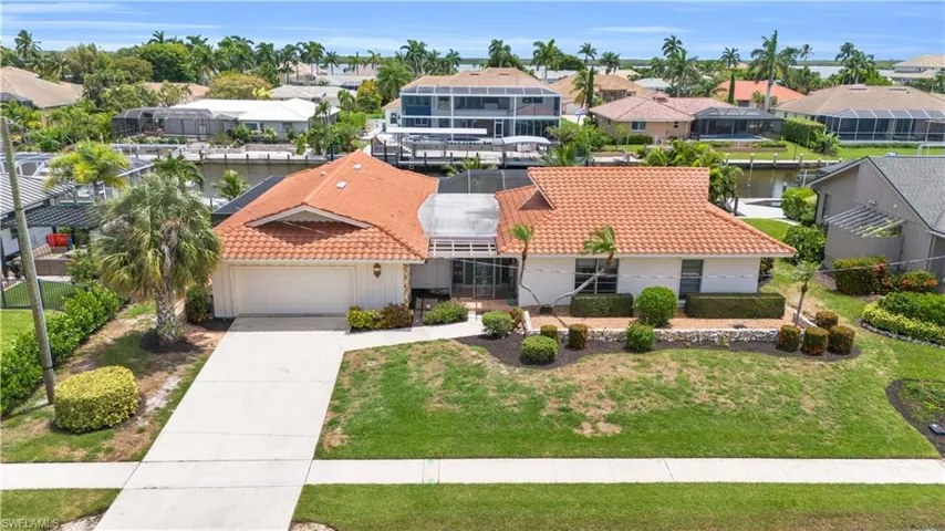 View of front of house with a front lawn