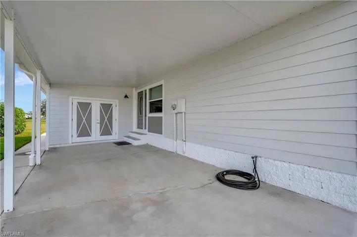 View of carport with french doors