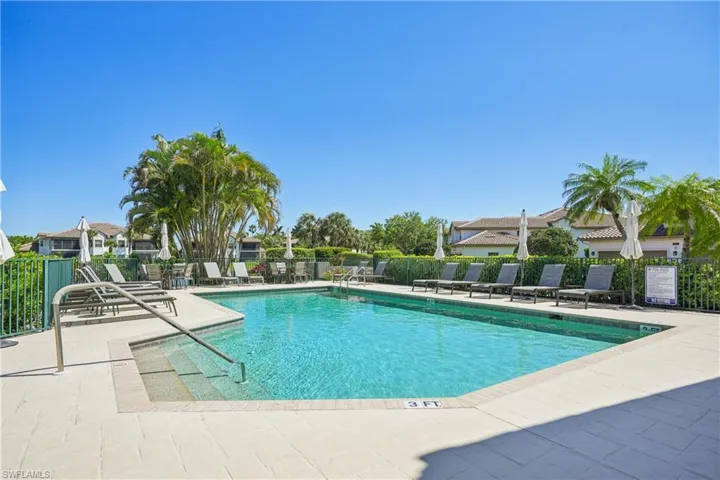 Community pool featuring a patio area