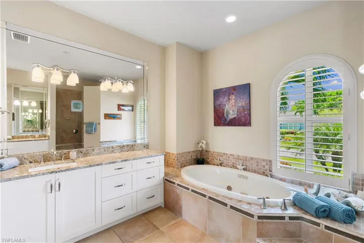 Jetted tub and separate sinks