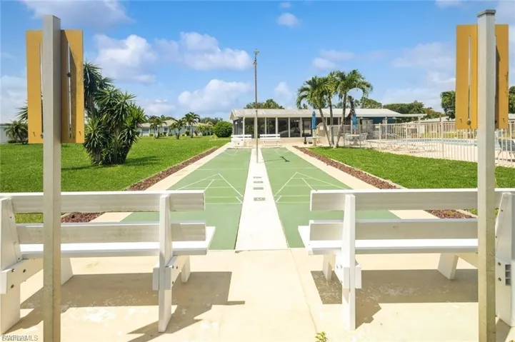 View of community with shuffleboard
