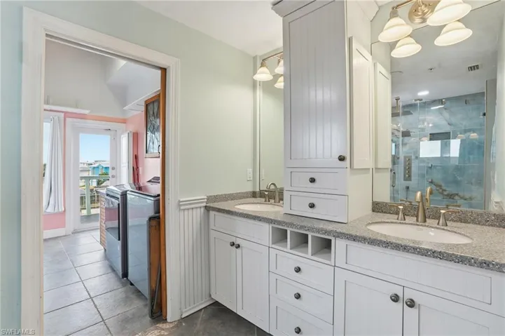 Full bathroom with double vanity - virtually enhanced