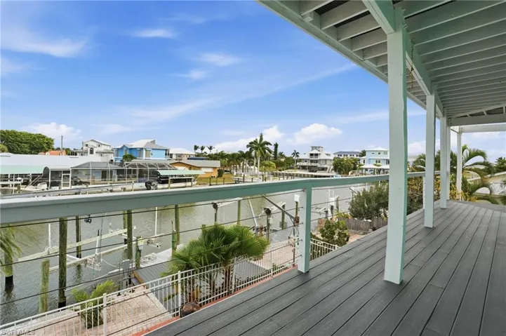 Exterior deck with canal views - virtually enhanced