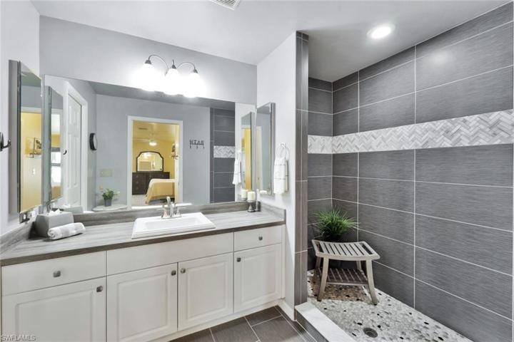 View of Renovated Master Bath and its New Vanity and New Tiled Shower