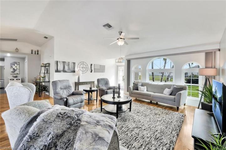 View of Greatroom Tasteful Furnishings toward Etched Glass Double FrontEntryway