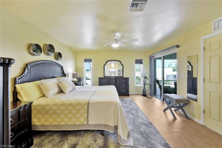 View of Master Bedroom Suite and Slider to Lanai under Truss