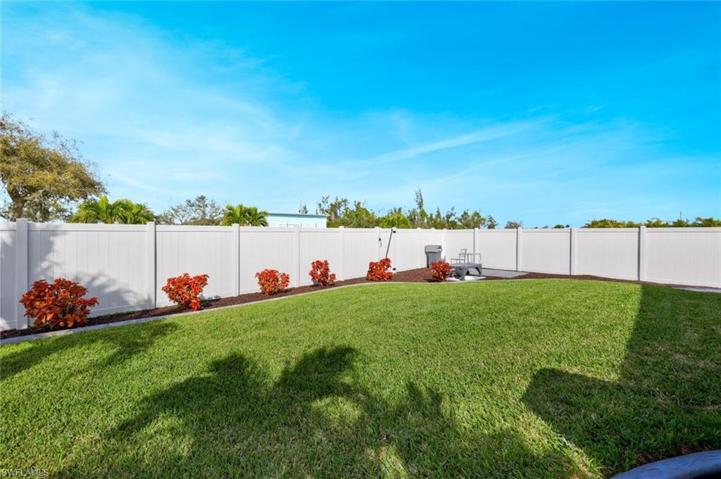 View of the Light Gray Backyard Vinyl Fence