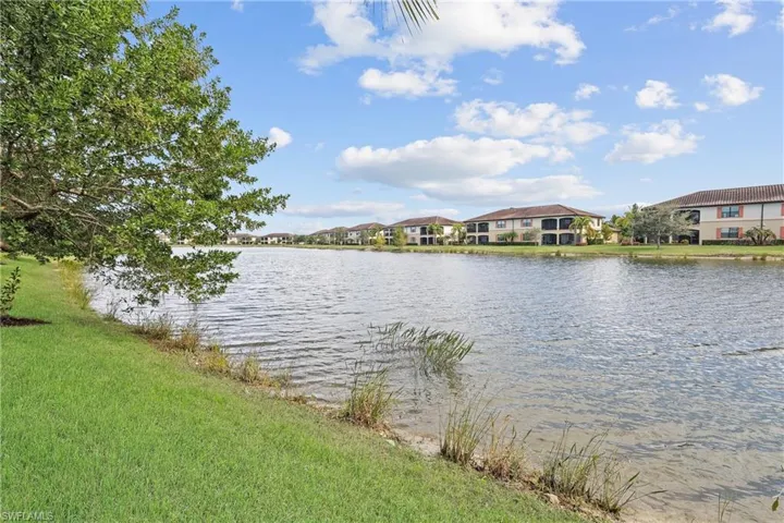 Water view featuring nearby suburban area