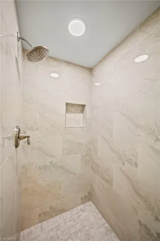 Bathroom with tiled shower