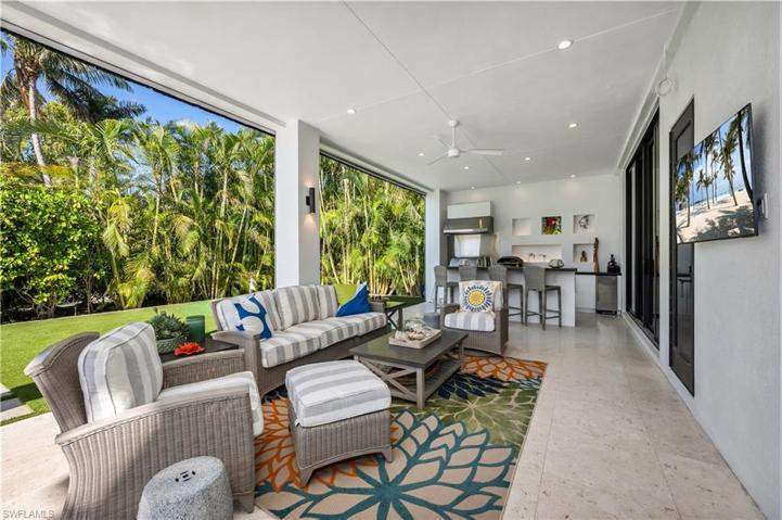 Outdoor family room with retractable screens