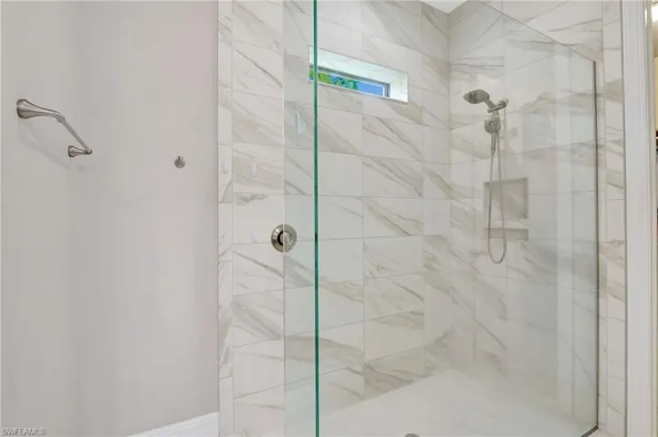Full bath featuring a stall shower