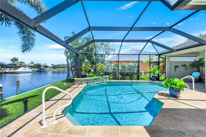 Large pool area with picture window screen