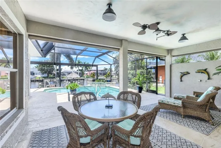 Large covered patio with remote controlled shutters