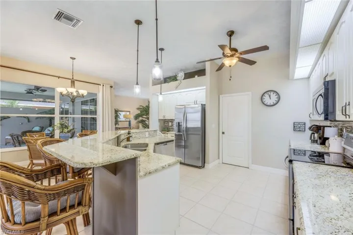 Large kitchen with stainless steel appliances