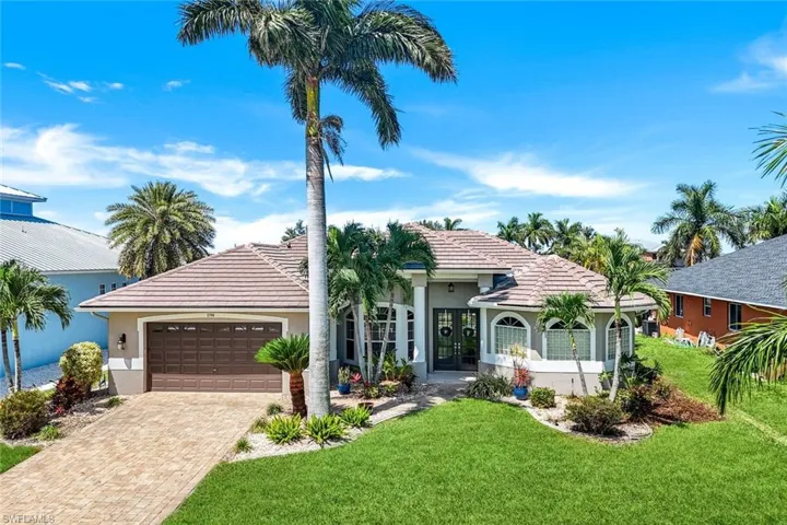 This stunning home had the Tile roof replaced in 2022 and paver driveway was added in 2019