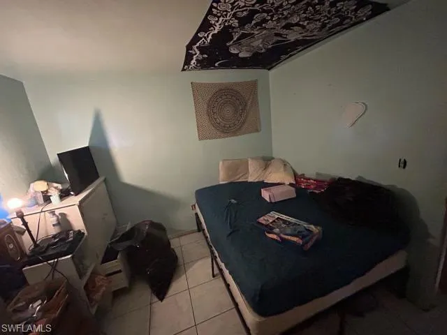View of tiled bedroom