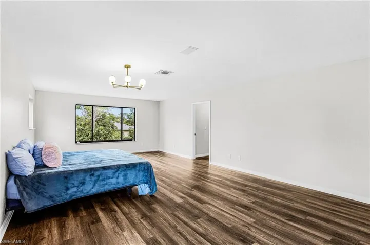 Primary Bedroom 2approx. 27' x 16', huge walk-in closet, large remodeled bathroom with double sinks and huge walk-in shower