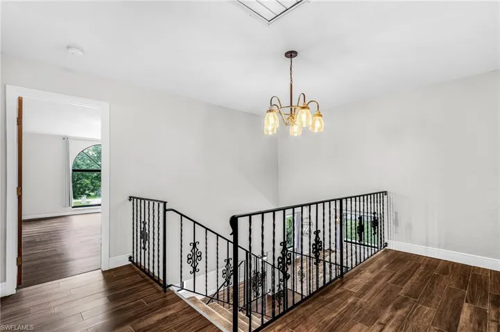 This is the landing area at top of stairs, new carpet on stairs since safer than slick tile.  There is a space at the side of landing