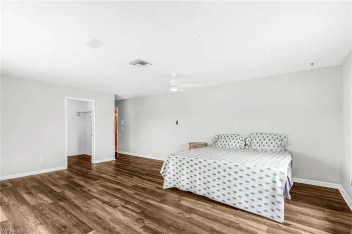 Primary bedroom 1approx 20'x15'9", 6'6"x7 foot walk in closet, remodeled bathroom