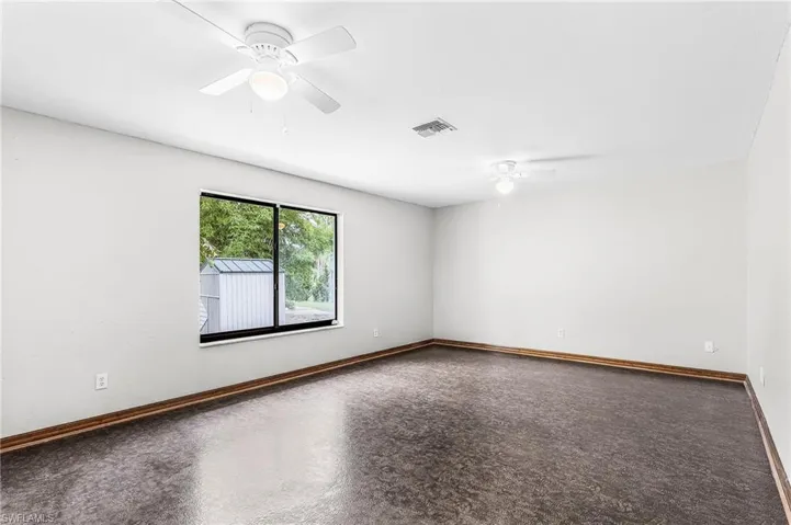 Office or den with lanai view approx 19'9" x 13'6"
