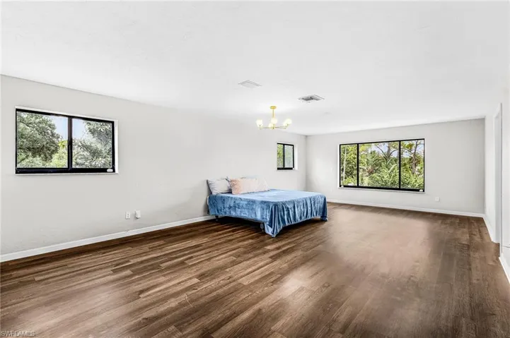 Primary Bedroom 2approx. 27' x 16', huge walk-in closet, large remodeled bathroom with double sinks and huge walk-in shower