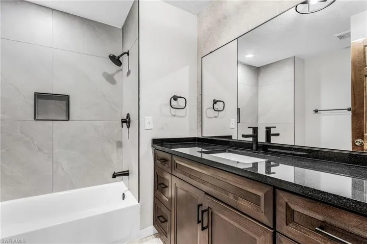 Guest Bathroom 3 remodeled with tub/shower, granite counter top