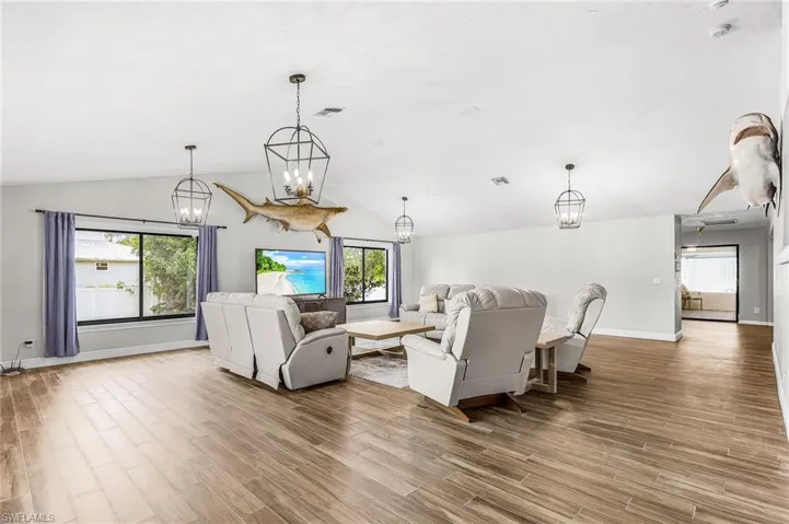 large living room approximately 30'6" x 24'9" without foyer