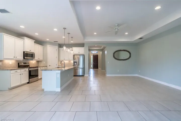 Kitchen walk in pantry and breakfast bar