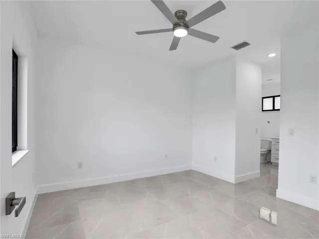 Empty room with recessed lighting, baseboards, visible vents, and ceiling fan