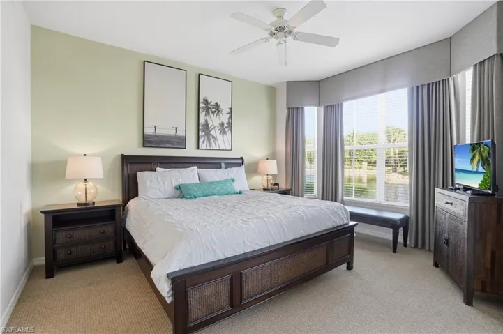 PRIMARY BEDROOM SUITE WITH WATER VIEWS FROM ALL WINDOWS!!