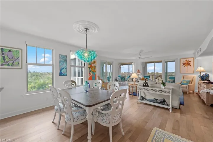 Dining area featuring light hardwood / wood-style floors and ceiling fan
