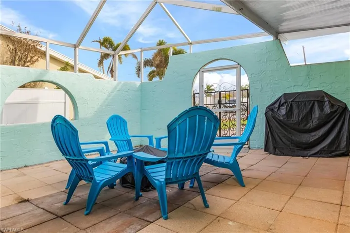 View of patio / terrace with grilling area and glass enclosure