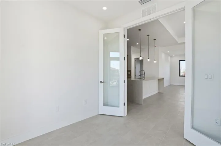 Office featuring baseboards and recessed lighting
