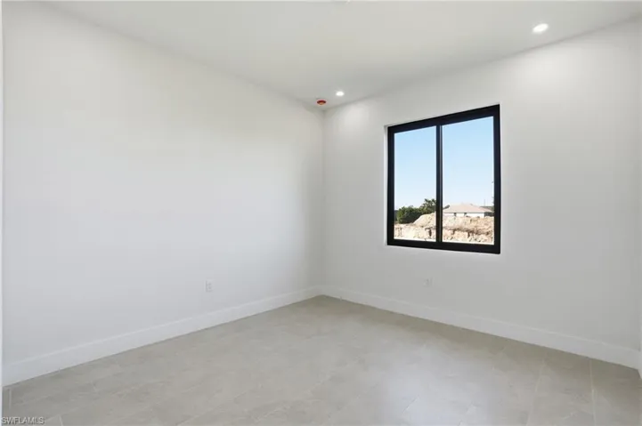 Dining room with baseboards and recessed lighting