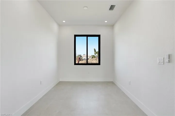 Dining room with baseboards and recessed lighting