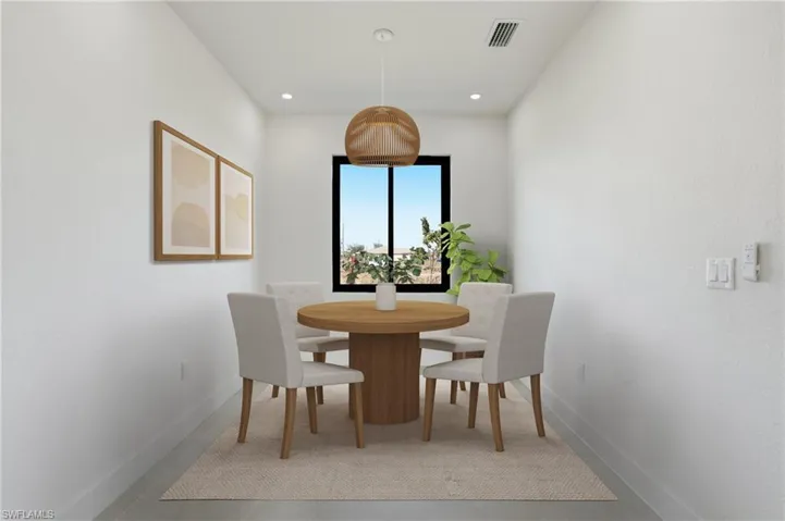 Dining space with baseboards and recessed lighting
